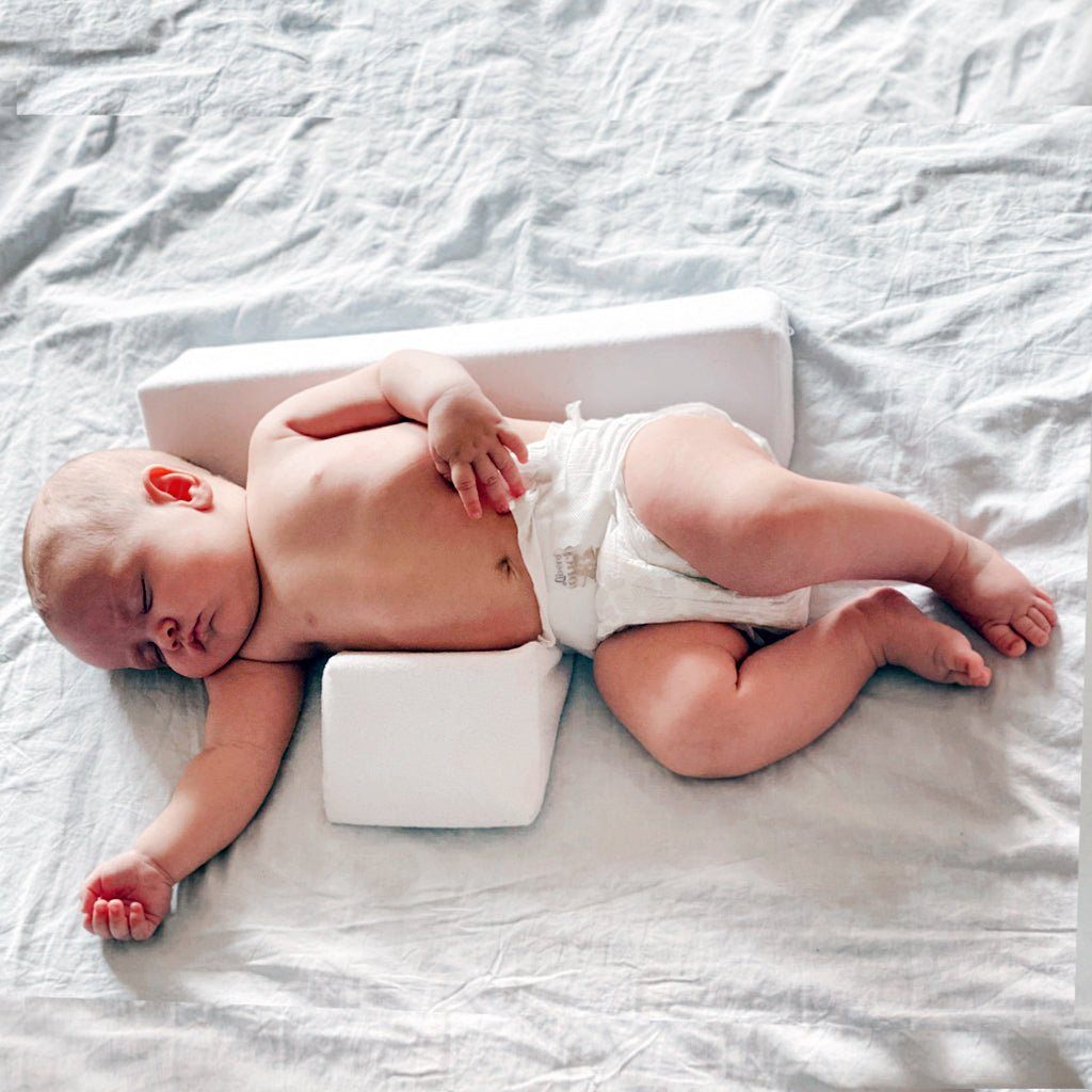 Baby pillow deals to stop rolling